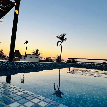 Hotel Mayari Holbox Exterior foto Sunset at the pool