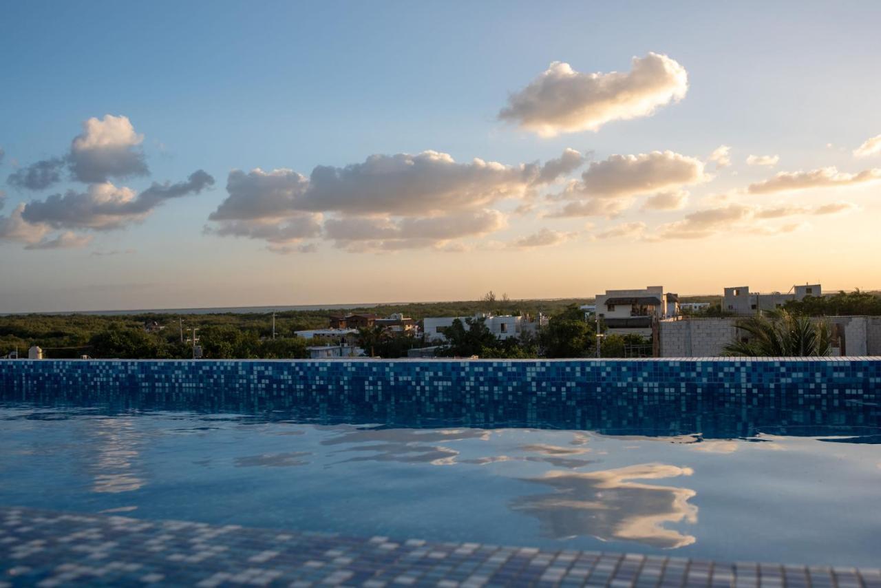 Hotel Mayari Holbox Exterior foto Sunset over Tulum